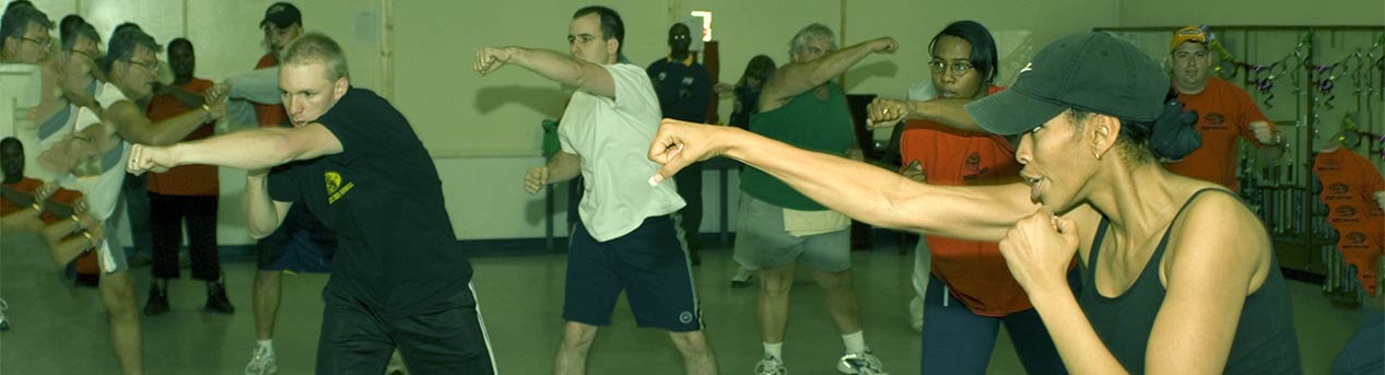 photo located below navigation menu of people in a boxing class