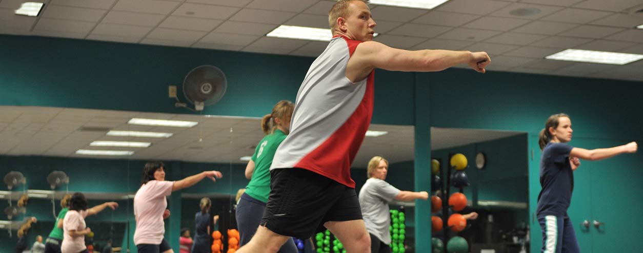 photo located below navigation menu of people exercising